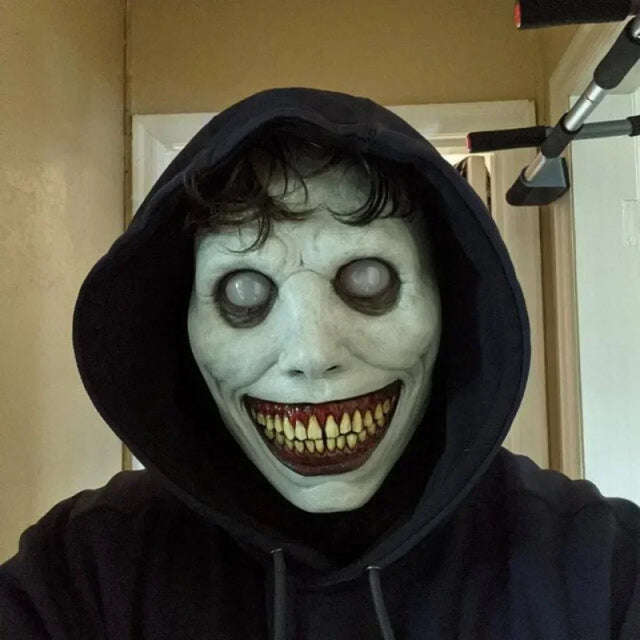 Creepy smiling demon grinning horror Halloween mask
